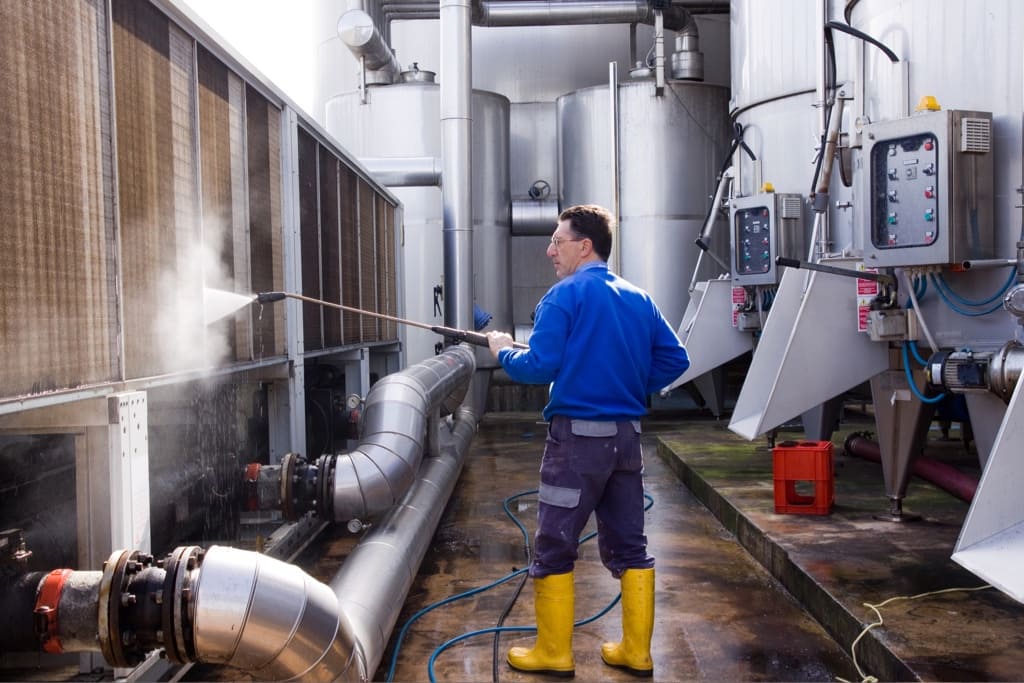 Man using pressure washer