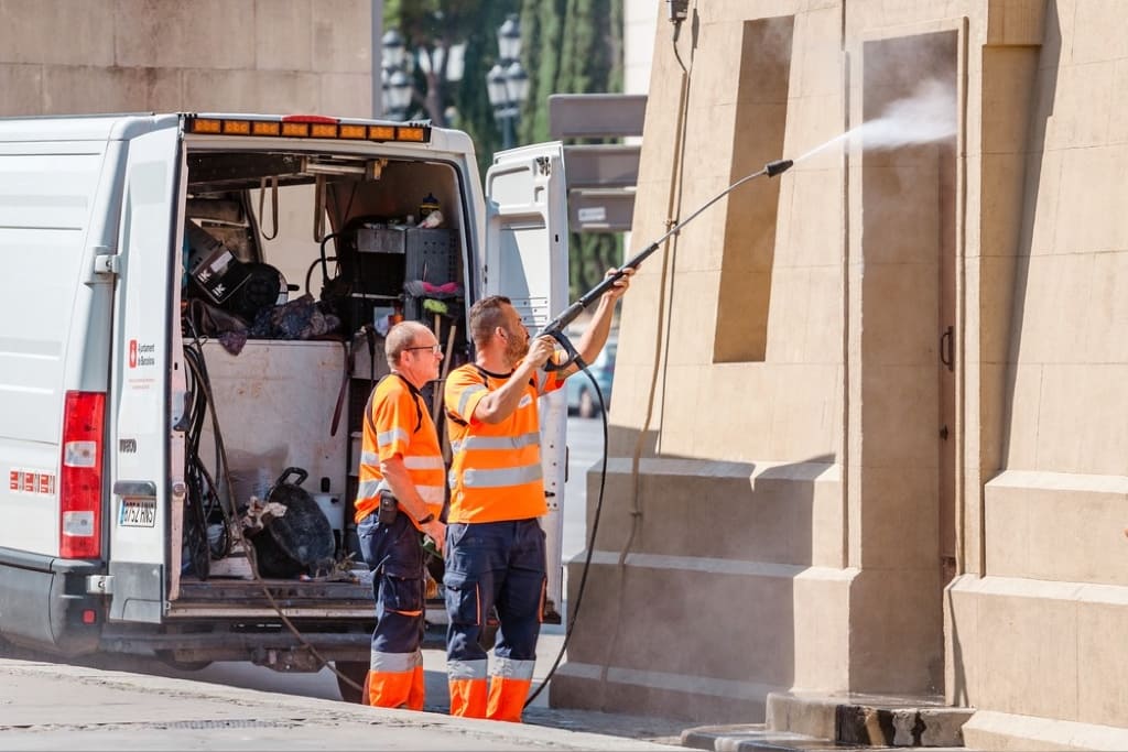 Man using pressure washer