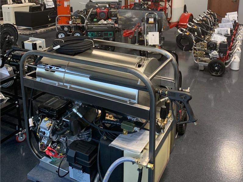 Various pressure washer units on display in the Power Cleaning Systems showroom.